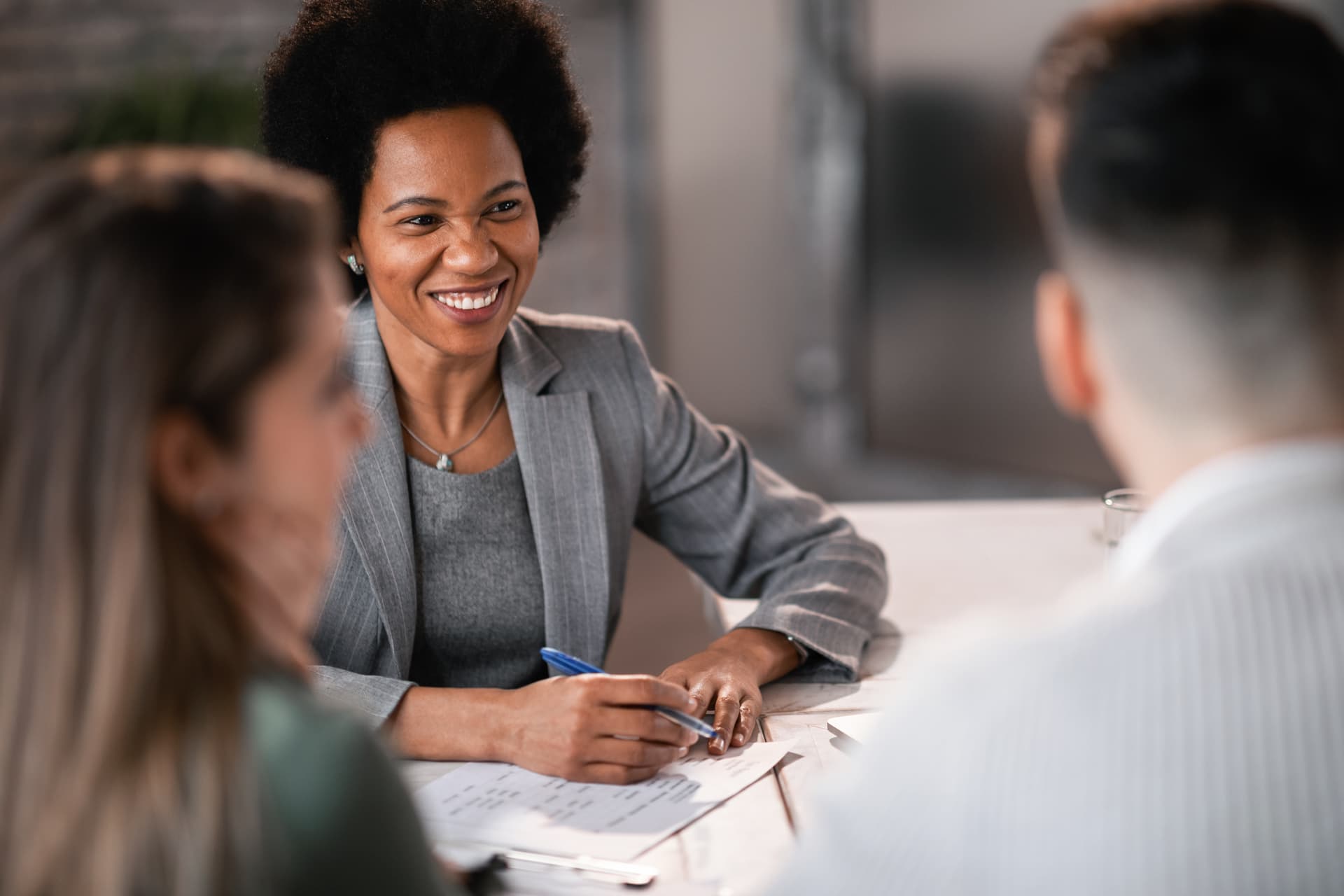 Financial advisor giving consultations to a couple