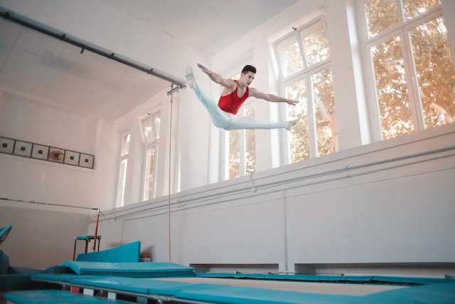 Gymnast jumping on a trampoline